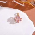 Ciondolo a quadrifoglio rotante con zircone rosa e finitura in ottone dorato - Ciondolo Quadrifoglio Rotante / Rosa