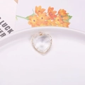 Transparent heart crystal pendant with faceted glass and gold wavy metal border charm - 18mm / White