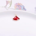 Red fan-shaped translucent pendant with gold metal edging on white ceramic plate - Fan Shaped Single Loop / Red