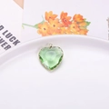 Green faceted heart crystal pendant with gold metal rim and top bail for jewelry making - Light Green