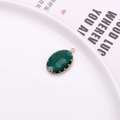 Ciondolo ovale in cristallo verde smeraldo con bordo in pizzo dorato e anello - Verde Scuro