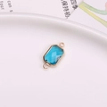 Connettore rettangolare placcato oro con cristallo blu scuro sfaccettato e anellini - Blu lago