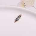 Oval faceted black stone pendant in gold-plated frame for DIY jewelry making - Gray