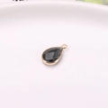 Pendentif goutte noir facetté avec bordure en métal doré pour la création de bijoux - Gris