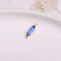Oval gold-plated connector with deep blue crystal for DIY jewelry making - Sapphire Blue