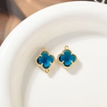 Deep blue clover crystal pendant with gold beaded frame and dual connection loops - Peacock Blue