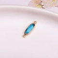 DIY oval faceted blue crystal pendant with gold-plated bezel and dual connection loops - Peacock Blue