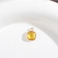 Square gold plated copper bezel pendant featuring transparent yellow crystal glass - Gold