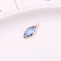 Marquise-cut light blue crystal pendant with gold-plated edge and hanging loop - Light Blue