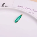 Dark green teardrop crystal pendant with gold-plated prong setting and top loop for jewelry - Peacock Green