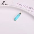 Faceted light blue teardrop crystal pendant with gold-plated metal frame for necklaces - Lake Blue