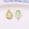 Copper gold-plated bird nest teardrop crystal pendants in mint green and iridescent yellow - Light Green