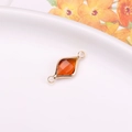 Orange amber marquise-shaped gold plated connector charm with double loops for DIY jewelry - Brown