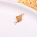 Orange faceted kite gemstone connector with gold frame and double link rings for DIY jewelry - Rose Quartz Color