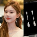 Silver drop earrings and V-necklace set with sparkling crystals for elegant evening wear - Silver-Long Teardrop Shape