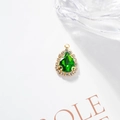 Elegant teardrop emerald crystal pendant with gold trim and halo cubic zirconia stones - Peacock Green