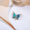 Blauwe vlinder hanger met gouden frame en inlegstenen voor DIY sieraden maken - Stersteen Dubbele Lus Vlinder / Blauw