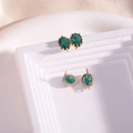 Oval 14K gold plated stud earrings with dark green emerald-like faceted crystals - Peacock Green
