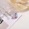 Teardrop faceted crystal pendant with iridescent AB coating in gradient purple and blue - 10x16 Teardrop Drilled Glass / Pink Purple