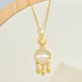 Golden dreamcatcher necklace featuring white cat eye stone and leaf charms for women - Dreamcatcher (WCY-0014) / Gold