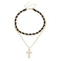 Dubbellaagse goud en zwarte choker ketting met kruishanger en kristallen details - Kruis hanger stijl