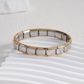 Detail of Italian charm bracelet links featuring gold and silver dual-tone heart patterns - Heart with Double Arrow Gold Edge (BD-220)