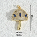 Macro detail of mushroom pendant with gold plating, white zircons, and blue stones - Mushroom Style (DZM-3692)