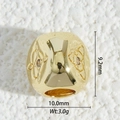 Macro shot of gold-plated heart bead with hollow pattern and dimensions for jewelry making - Hollow Bead Style (DZM-3698)
