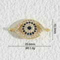 Macro shot of 18K gold plated evil eye connector with blue and white cubic zirconia - Evil Eye Connector (DZM-3713)