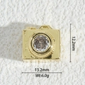 Macro shot of 18K gold plated camera pendant with large zircon stone inlay 13.2mm - Camera Style (DZM-3716)