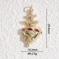 Macro shot of sacred heart gold pendant with dimensions 29.4mm height and 14.3mm width - Sacred Heart Style (DYS-5500)