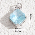Macro shot of 13.6x10.8mm light blue faceted crystal pendant with micro-pave side stones - Gold Base Light Blue Square (DYS-5559)