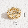 Macro view of gold-plated hollow bead with clear zircons, size 9.7mm by 4.8mm - Gold Hollow Ring Spacer Bead (DYS-5562)