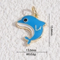 Detail view of blue dolphin enamel pendant with gold trim, size 15.6mm by 13.0mm - Blue Dolphin Style (DLD-5379)