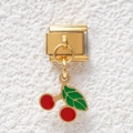 Detailed view of Italian charm link featuring a red cherry pendant on gold metal base - Cherry Style (GMKDZ-498)