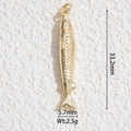Macro detail of a 33mm gold-plated fish pendant with fine scales and fin textures - Long Small Fish Pendant(DYS-5700)