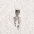 Detailed view of a silver steel bow pendant for DIY modular link bracelets with tassels - Polished Bowknot Style (MKDZ-805)