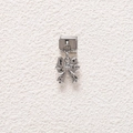 Close-up of a silver bow charm pendant for Italian modular charm bracelets - Pleated Bowknot Style (MKDZ-806)