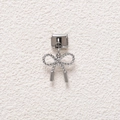 Close-up of a silver bow charm with woven texture for modular Italian style bracelets - Woven Texture Bowknot Style (MKDZ-807)