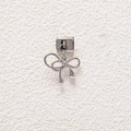 Detailed view of a silver bow charm pendant for modular DIY jewelry making - Knot Bowknot Style (MKDZ-808)