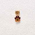Detailed macro shot of golden dog paw charm with Christmas tree pattern for charm bracelets - Deep Purple Christmas Tree Paw Print Style (GMKDZ-566)