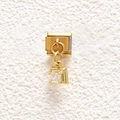 Detailed close-up of a golden Italian link charm with a square-cut clear cubic zirconia - Square Prong Set Transparent Stone (MKDZ-866)