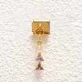 Macro detail of Italian gold stainless steel charm with three purple triangular gemstones - Triple Color Purple Gradient Triangle Style (MKDZ-832)