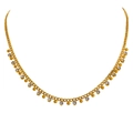 Elegante collar de acero de titanio dorado con pedrería blanca y colgantes redondos - Dorado