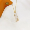 Gold titanium steel bamboo joint necklace with white pendant and butterfly accent - White (O-Chain)