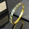 Bracciale vintage in acciaio al titanio dorato con motivi floreali in smalto blu - Fiore E Foglia Oro (4175)