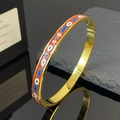 Bracciale in acciaio al titanio dorato con smalto rosso e motivo malocchio - Rosso Blu Oro (4176)