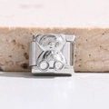 Macro-opname van een gepolijste zilveren beermodule voor een DIY Italiaanse armband - 3D Beer Stijl (MK-3131)