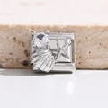 Macro-opname van Italiaanse charm-link met zirkoon schelp en zeester bedels in zilver - Zeester Schelp Stijl (MK-3142)