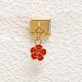 Macro detail of Italian charm with gold stainless steel base and red enamel rose pendant - Rose Style (GMKDZ-705)